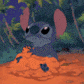 a cartoon character is sitting in a pile of dirt eating a piece of fruit .