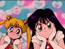 sailor moon and mars are standing next to each other and smiling