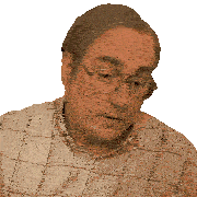 a man wearing glasses and a plaid shirt is looking at the camera