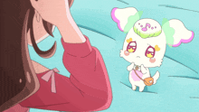 a cartoon drawing of a girl looking at a small white dog