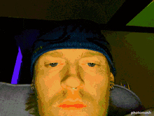 a pixelated image of a man 's face with the watermark photo mosh