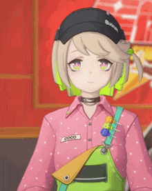 a girl wearing headphones and a pink shirt has a name tag that says coco