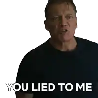 a man in a black shirt with the words " you lied to me " on the bottom