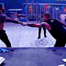 Kevin Owens Pop Up Powerbomb GIF - Kevin Owens Pop Up Powerbomb Roman Reigns GIFs