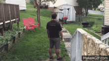 a man wearing a black shirt that says ' i 'm sorry i 'm sorry ' on it