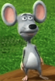 a cartoon mouse is standing on a wooden table in front of a grassy field .