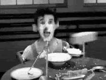 Automated Eating GIF - Comedy Classic Modern Times GIFs