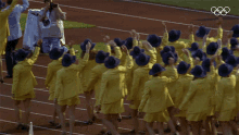 munich women ladies in yellow waving marching