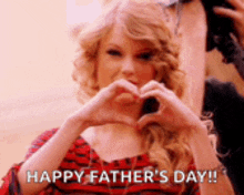 a woman is making a heart shape with her hands and says happy father 's day ..