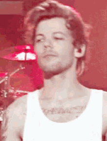 Louis Tomlinson One Direction GIF - Louis Tomlinson One Direction Tongue Out GIFs