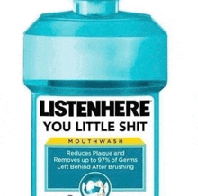 a bottle of listen here you little shit mouthwash that reduces plaque and removes up to 97 % of germs left behind after brushing