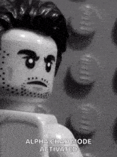 a black and white photo of a lego man with the words alpha chad mode activated below him