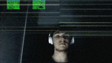 a man is standing in front of a mirror with a light shining on him .
