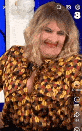 a woman in a leopard print shirt is making a funny face on a video .