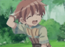a boy with red hair is standing in a grassy field with his mouth open