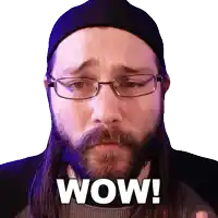 a man with glasses and a beard has the word wow on his face