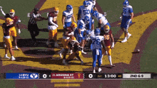 a football game is being played between arizona state and byu