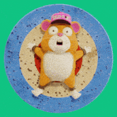 a cartoon cat laying on its back on a blue plate