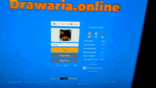 a person 's hand is pressing a button on a computer screen that says ' online ' on it