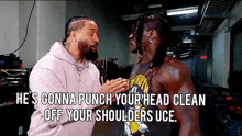 a man talking to another man with the words he 's gonna punch your head clean off your shoulders uce below him