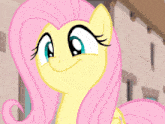 a close up of a cartoon pony with pink hair