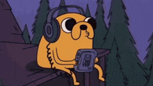 a cartoon dog is wearing headphones and holding a tape player .