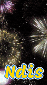 a fireworks display with the name nalis written in yellow