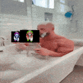 a man is taking a bath in a tub with a picture of mario and luigi on it