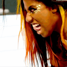ember moon tongue out wwe mitb money in the bank