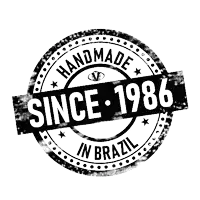a black and white stamp that says " handmade since 1986 in brazil "