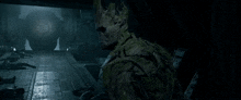 groot from guardians of the galaxy is standing in the dark