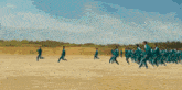 a group of people in green uniforms with the number 324 on their chests