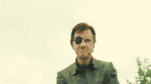a blurry picture of a man with the letters a and mc visible