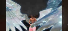a man in pink shorts is standing in front of a large angel wings