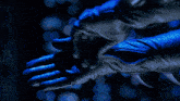 a close up of a person 's leg with a blue background