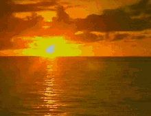 A Caribbean Sunset Sunset Over Water GIF - A Caribbean Sunset Sunset Over Water Sunshine GIFs