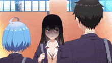 a girl with a sad look on her face is standing next to a boy