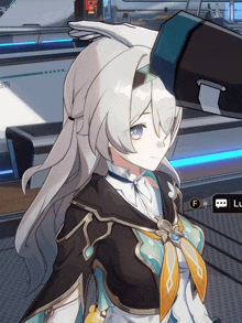 a close up of a girl 's face in a video game with the letter f in the corner