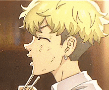a close up of a cartoon character eating noodles with chopsticks .