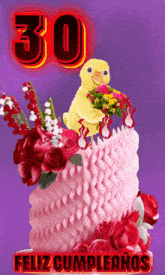a pink cake with flowers and the number 30