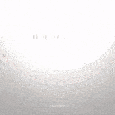 a close up of a person 's face with a blurred background and a few lines coming out of it .