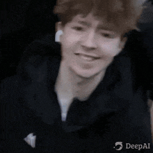 a close up of a person 's face with a blurred background and the words deepai on the bottom .