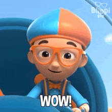 a close up of a cartoon character with the word wow on his chest