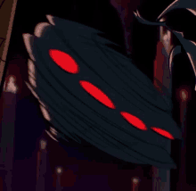 a close up of a cartoon character with red eyes