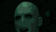 a close up of a person 's mouth with the words `` avada kedavra '' written on it .