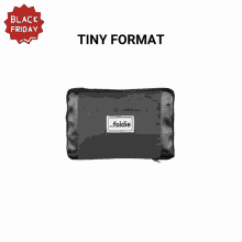 the inside of a black bag with a black friday sticker above it