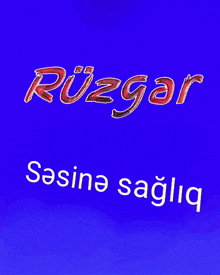 a blue background with the word ruzgar in red letters