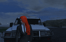 a woman with red hair is standing in front of a car