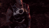 a man with a beard and glasses is dressed as a warrior