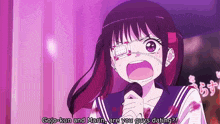 a girl with a bandage on her eye is singing into a microphone